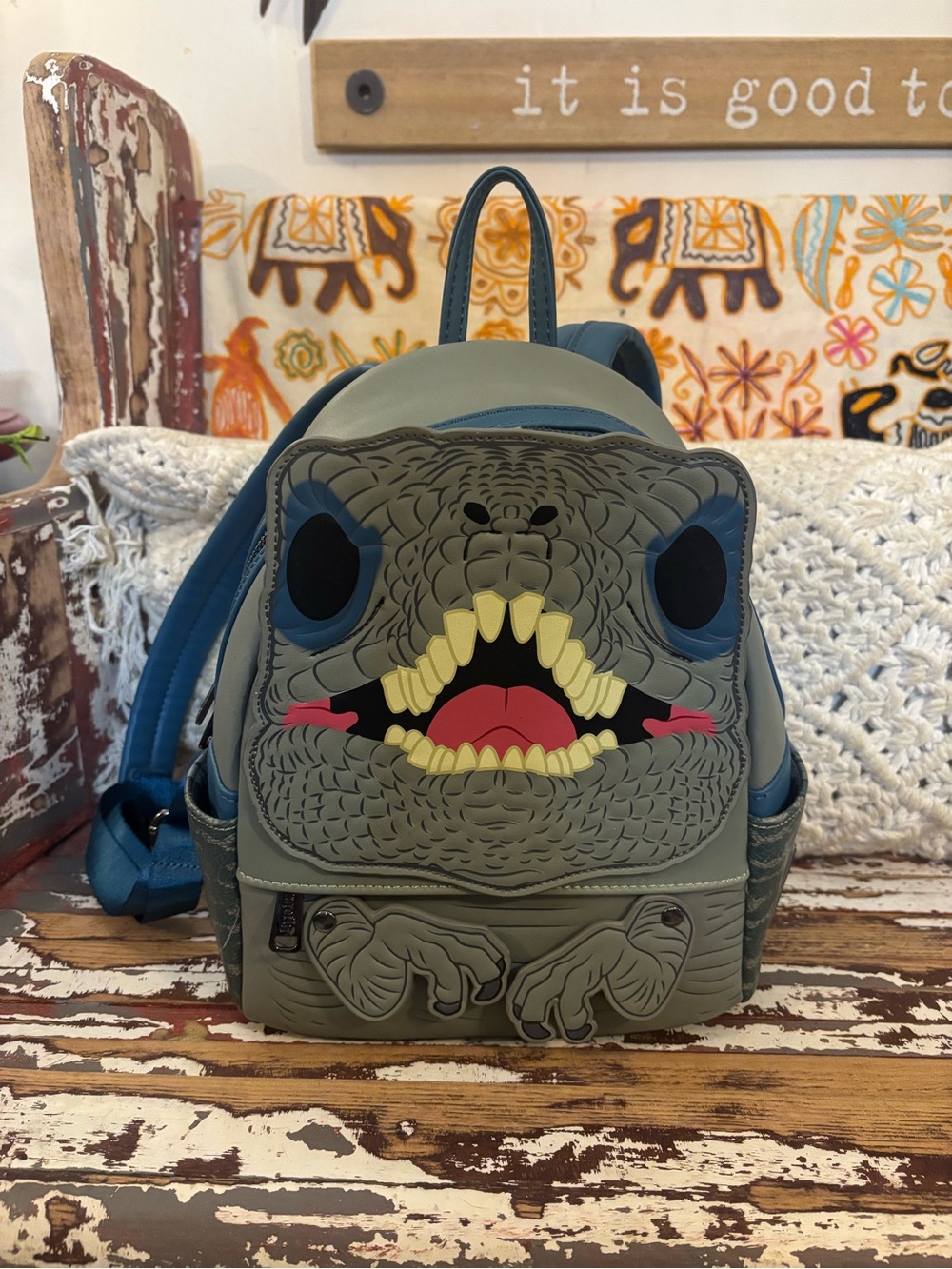 Loungefly Dinosaur Face Mini Backpack in Gray and Blue